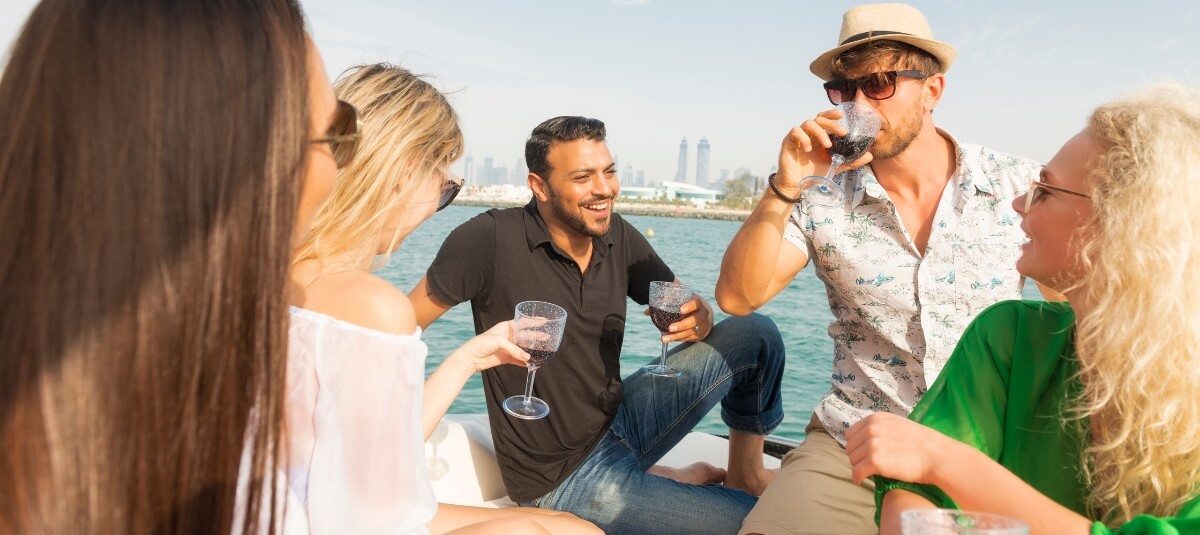 Group of friends enjoying life abroad, symbolising the lifestyle benefits of moving overseas from the UK. Group of friends enjoying life abroad, symbolising the lifestyle benefits of moving overseas from the UK.