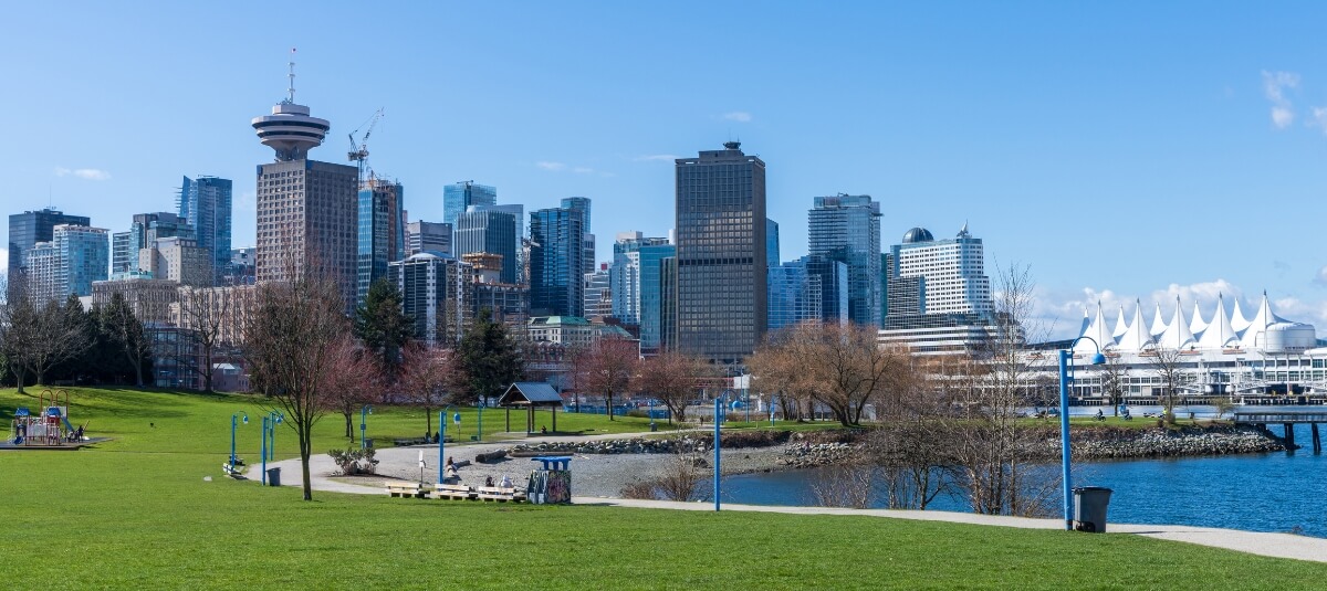 Vancouver skyline and waterfront park showing lifestyle in Canada for UK expats