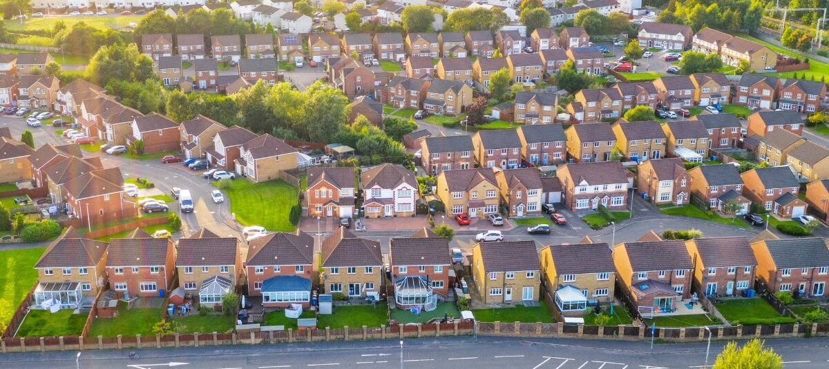 Aerial view of UK residential neighbourhood, reflecting cross-country house removals and long distance moving services.