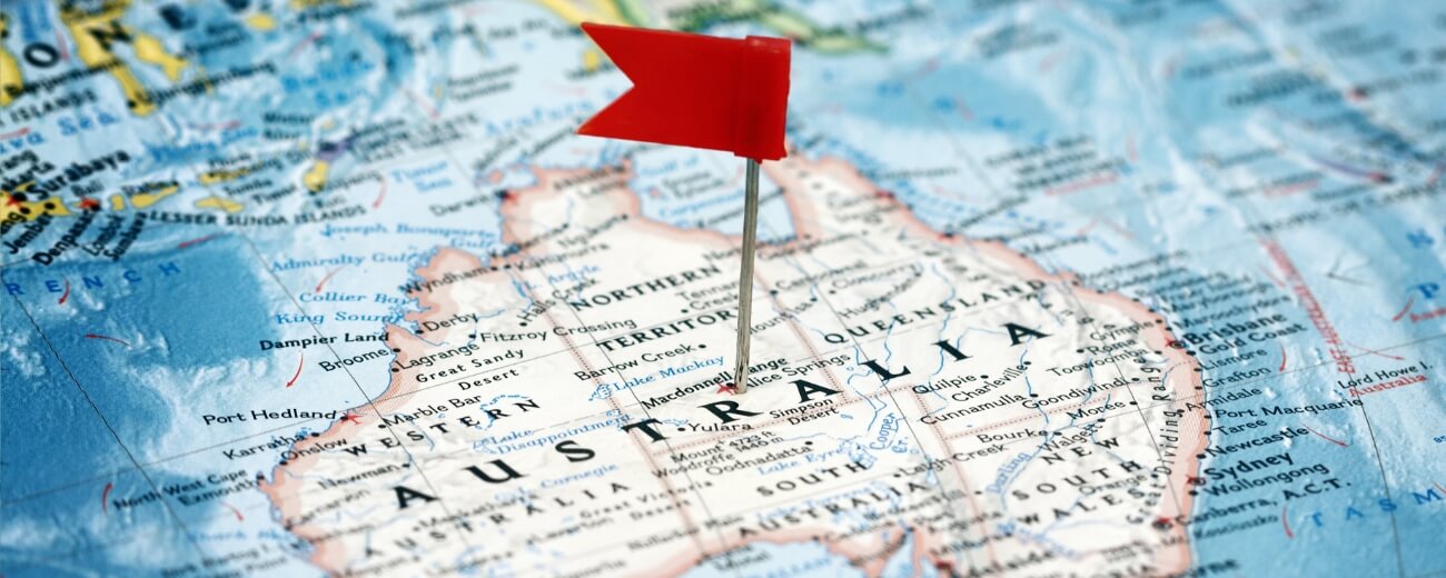 Map of Australia with red location pin symbolising moving from the UK Map of Australia with red location pin symbolising moving from the UK
