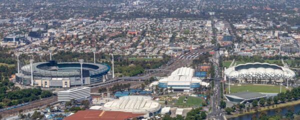 Aerial view of Melbourne’s iconic sports precinct, including the Melbourne Cricket Ground (MCG) and nearby stadiums.