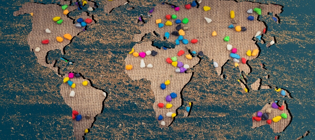 World map with colourful pins showing popular destinations for UK citizens moving overseas. World map with colourful pins showing popular destinations for UK citizens moving overseas.