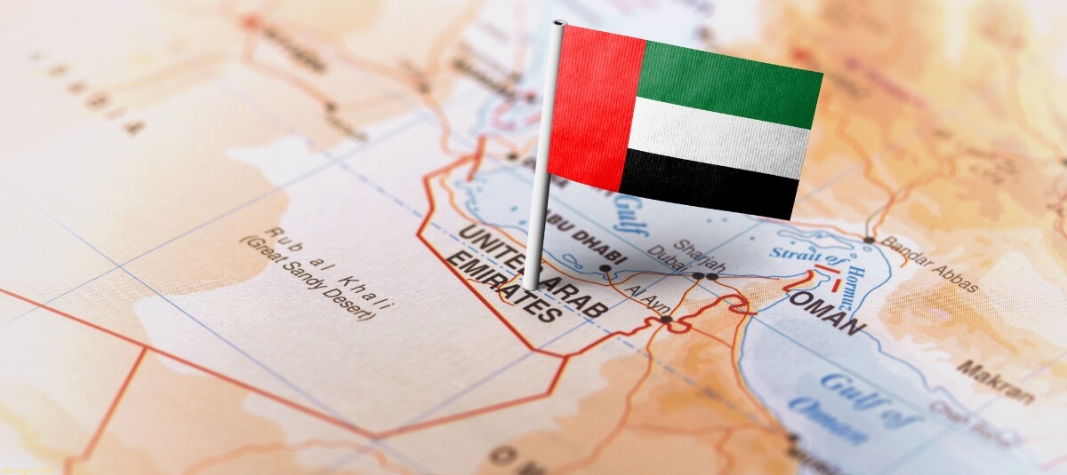 Map of the United Arab Emirates with the UAE flag pinned on it. Map of the United Arab Emirates with the UAE flag pinned on it.