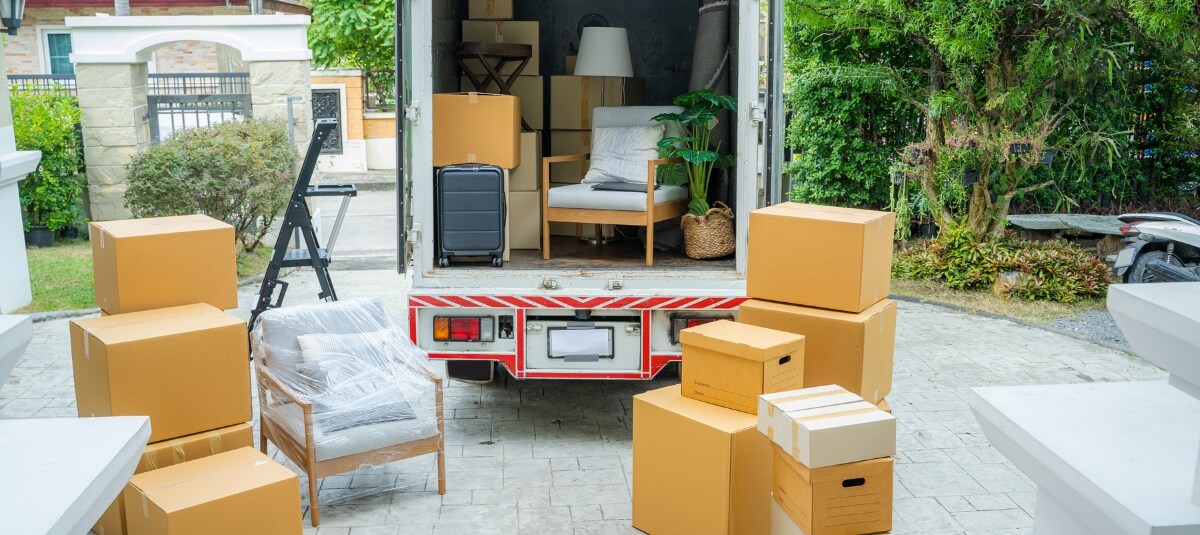 Packed boxes and furniture in moving truck for a UK to Spain house removal Packed boxes and furniture in moving truck for a UK to Spain house removal