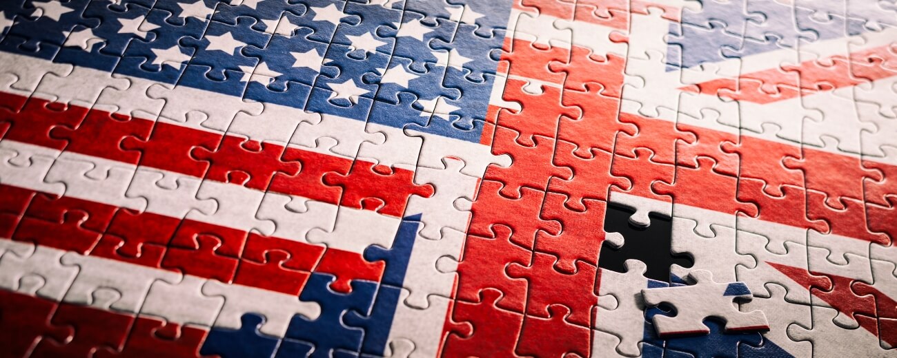 American and British flags as puzzle pieces fitting together, symbolising moving from the UK to the USA