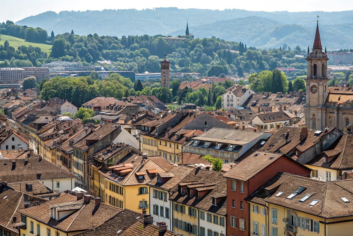 Elevated view over Winterthur’s rooftops and historic skyline, showcasing the city’s picturesque setting and peaceful atmosphere. Elevated view over Winterthur’s rooftops and historic skyline, showcasing the city’s picturesque setting and peaceful atmosphere.